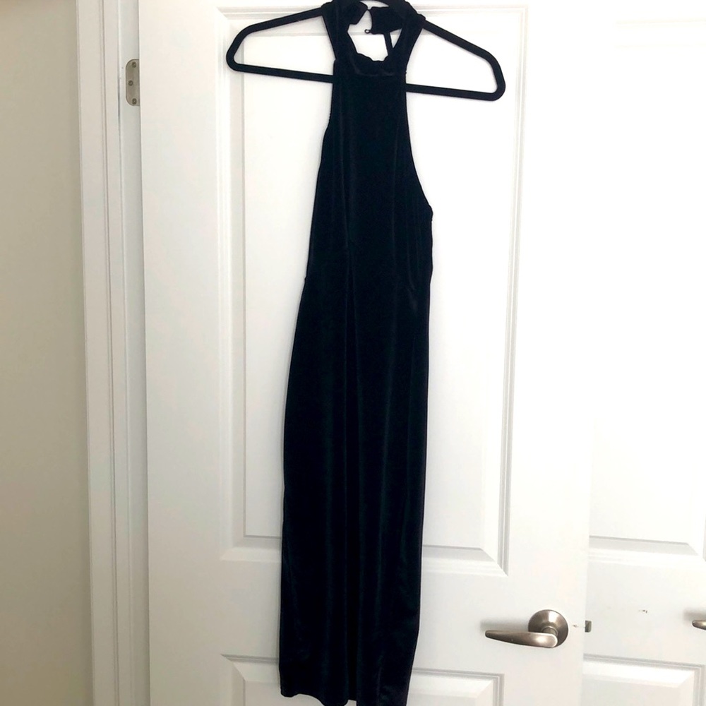 Long black velvet dress.